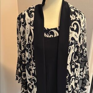 Women’s two piece pant suit.